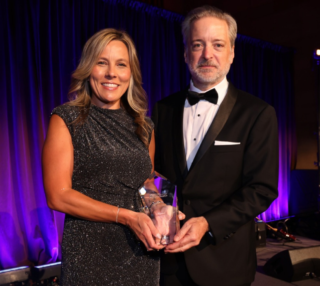Danielle Delongchamp accepting the 2025 Wealthies award